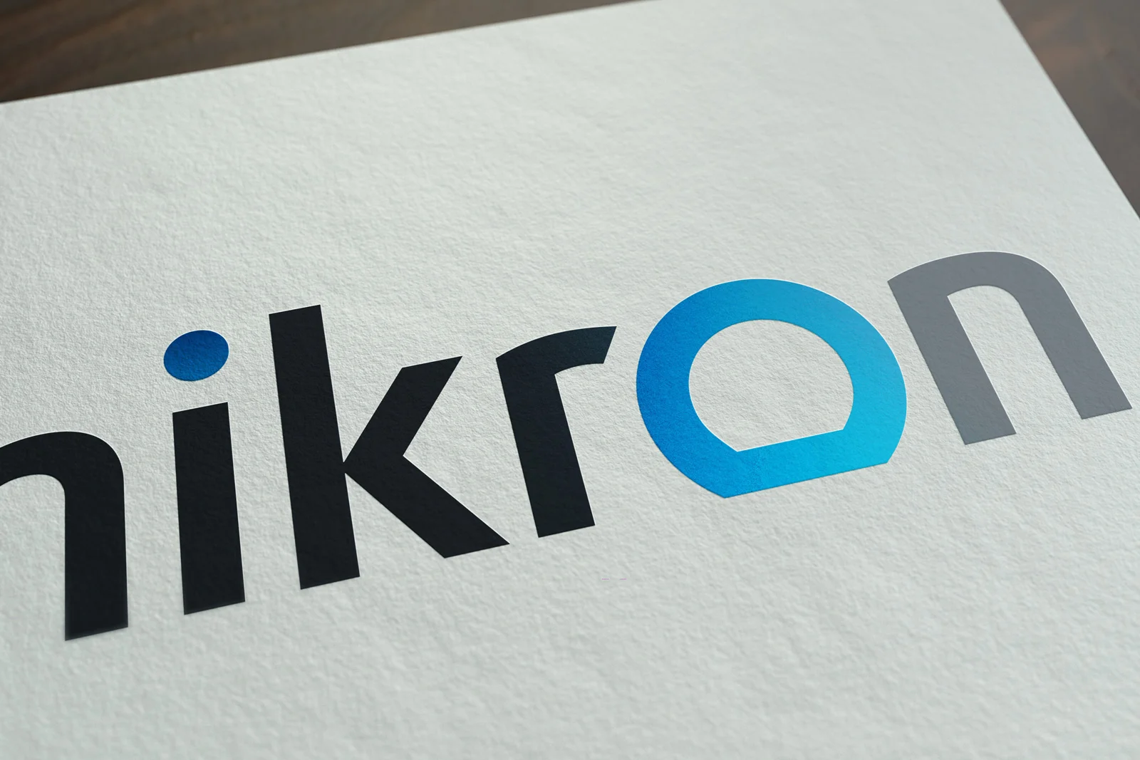 Микрон логотип на бумажном носителе